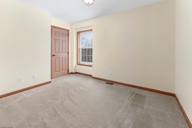 view of carpeted spare room