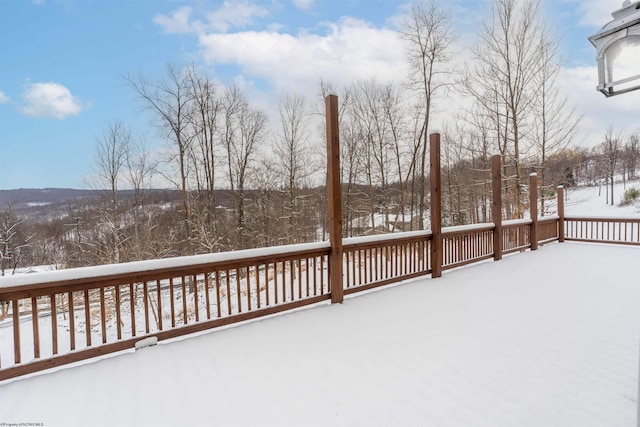 view of snow covered deck