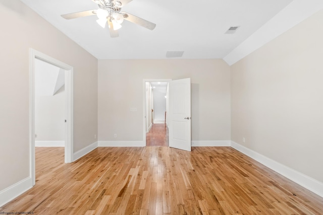 spare room featuring ceiling fan and light wood-type flooring