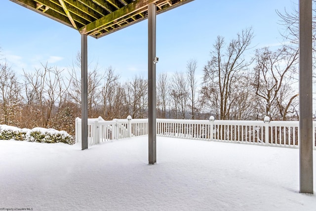 view of yard layered in snow