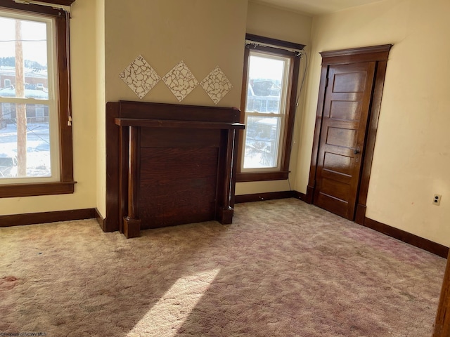 interior space featuring light colored carpet