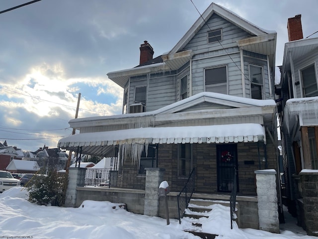 view of front of home featuring covered porch