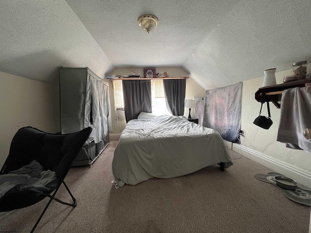 bedroom with a textured ceiling, light colored carpet, and lofted ceiling