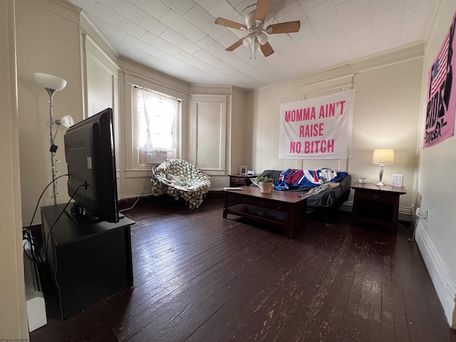 sitting room featuring ceiling fan, dark hardwood / wood-style flooring, cooling unit, and ornamental molding