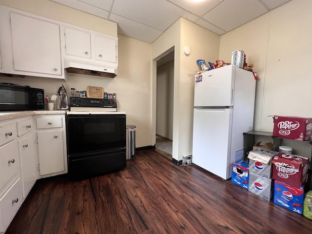 kitchen with a paneled ceiling, white cabinetry, and black appliances