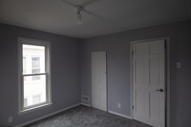 unfurnished bedroom featuring carpet flooring