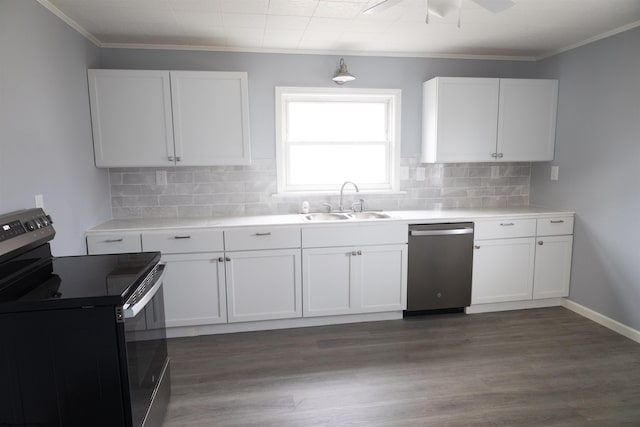 kitchen with white cabinets, dark hardwood / wood-style floors, sink, and stainless steel appliances