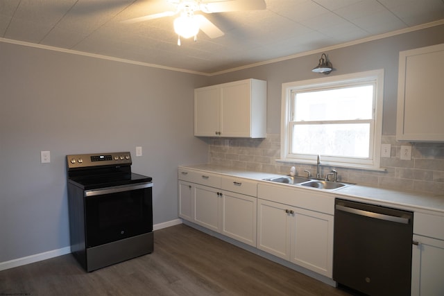 kitchen featuring backsplash, sink, white cabinetry, and stainless steel appliances