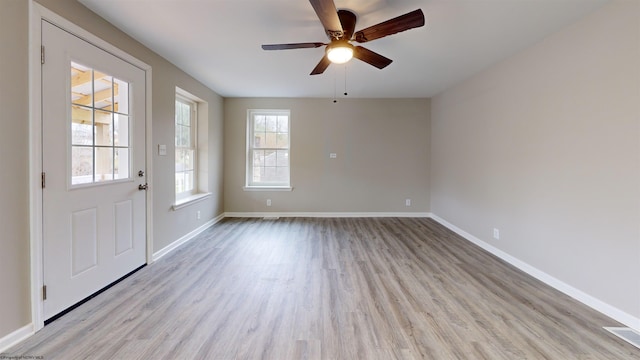 interior space featuring light hardwood / wood-style floors and ceiling fan