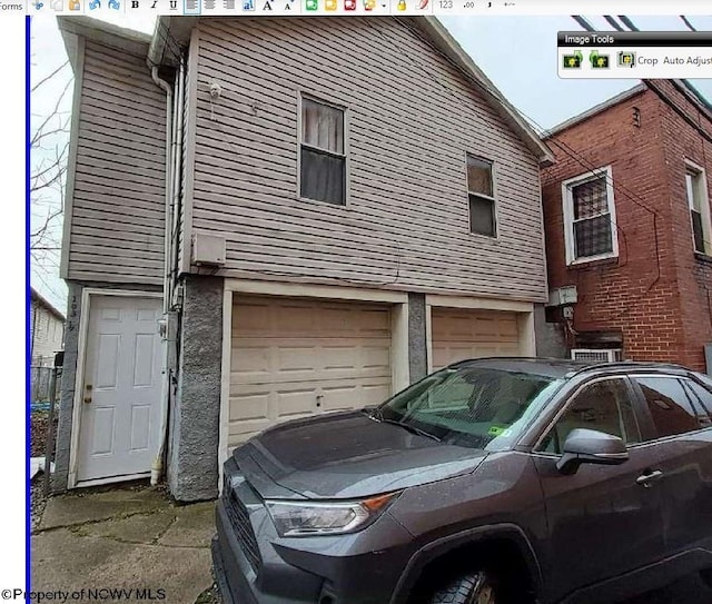 view of home's exterior featuring a garage