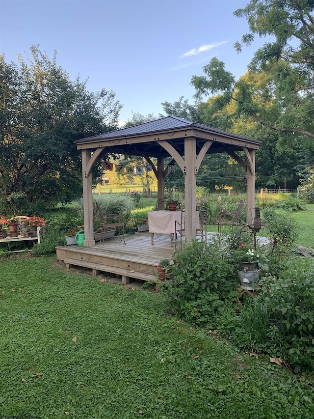 view of yard featuring a gazebo and a deck