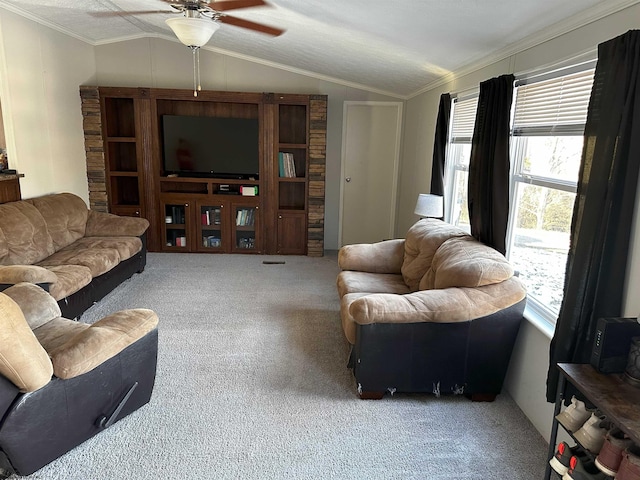 living room with ceiling fan, crown molding, carpet floors, a textured ceiling, and vaulted ceiling