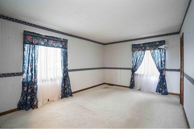 spare room featuring carpet