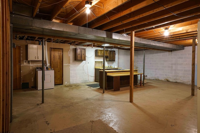 basement featuring washer and dryer