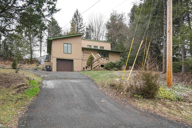 view of front of home featuring a garage