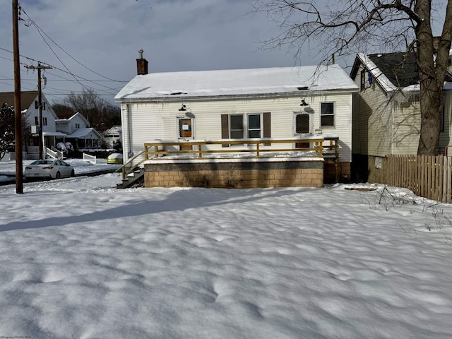 view of snow covered property