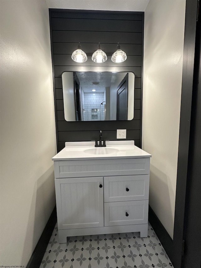 bathroom with vanity and tile patterned floors