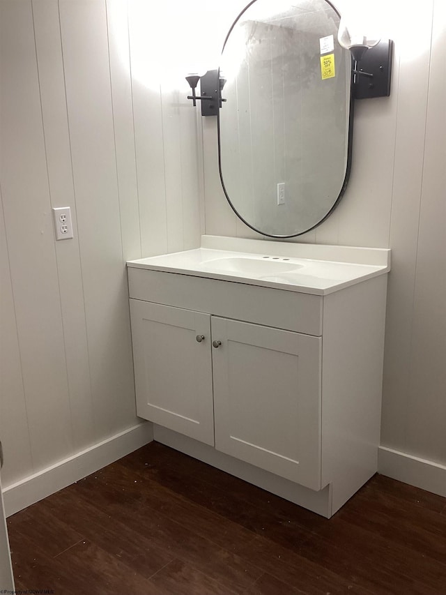 bathroom featuring hardwood / wood-style floors and vanity