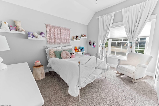 bedroom featuring vaulted ceiling and carpet floors