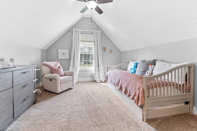 bedroom featuring ceiling fan, light colored carpet, and lofted ceiling