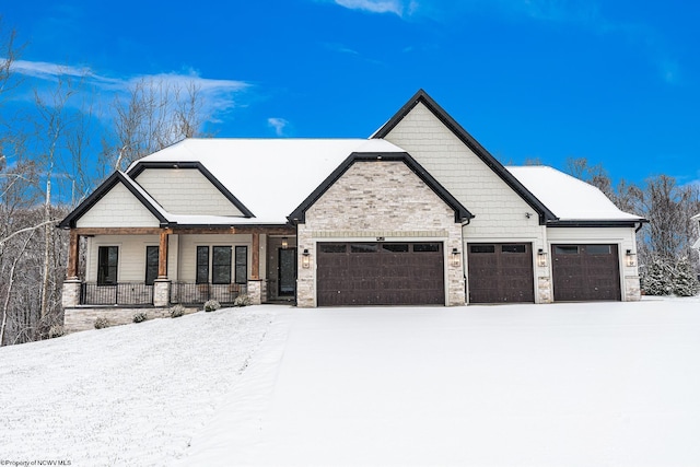 craftsman house featuring a garage and a porch