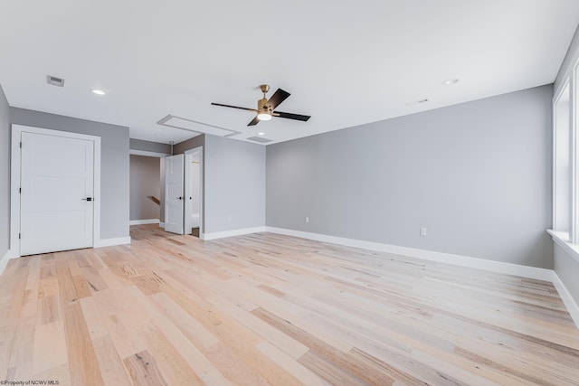 unfurnished room featuring light hardwood / wood-style floors and ceiling fan