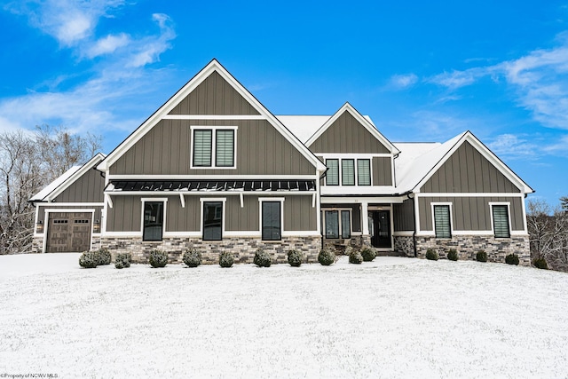 craftsman house with a garage