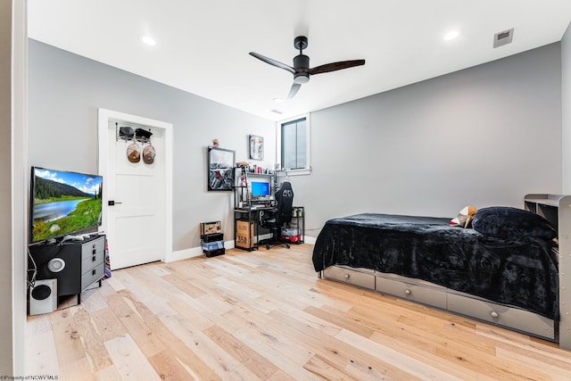 bedroom featuring ceiling fan and light wood-type flooring