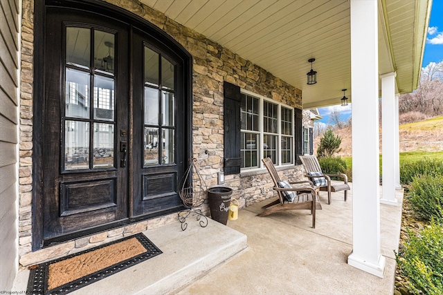 entrance to property with a porch