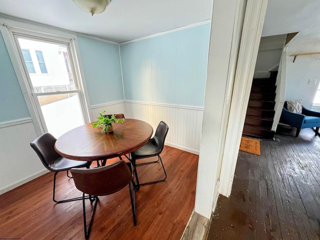 dining space featuring dark wood-type flooring