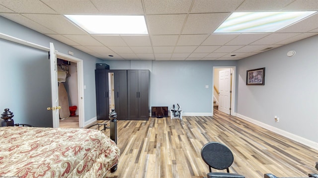 bedroom featuring wood-type flooring