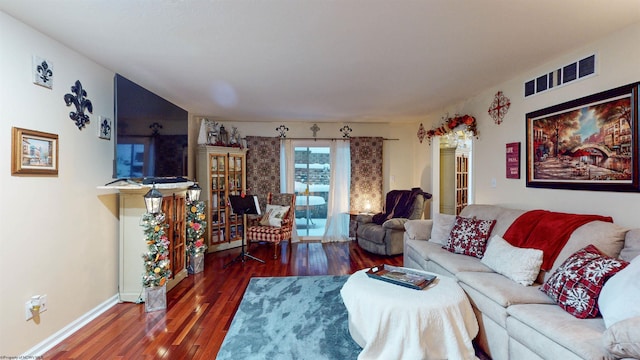 living room featuring dark hardwood / wood-style flooring