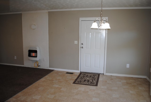 9412 Morgantown Pike, Philippi, WV 26416 - foyer entrance with baseboards, heating unit, a chandelier, and a textured ceiling