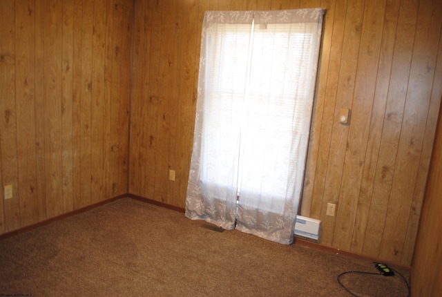 9412 Morgantown Pike, Philippi, WV 26416 - carpeted empty room featuring wooden walls, baseboards, and visible vents