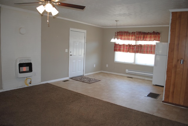 9412 Morgantown Pike, Philippi, WV 26416 - foyer entrance featuring ceiling fan, ornamental molding, visible vents, a baseboard heating unit, and heating unit