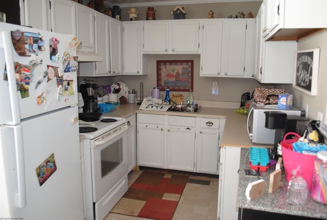 9412 Morgantown Pike, Philippi, WV 26416 - kitchen with white cabinetry, under cabinet range hood, light countertops, and white appliances