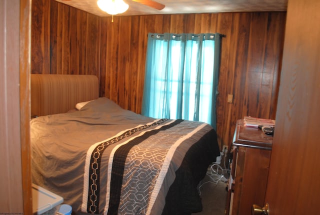 9412 Morgantown Pike, Philippi, WV 26416 - bedroom featuring wooden walls, multiple windows, and a ceiling fan