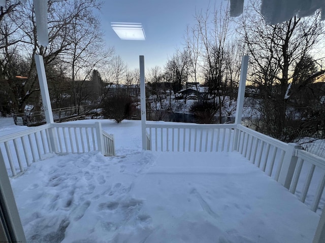 view of snow covered deck