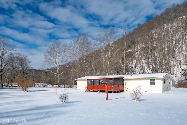 view of front of property with an outbuilding