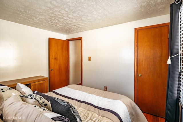 bedroom with a textured ceiling