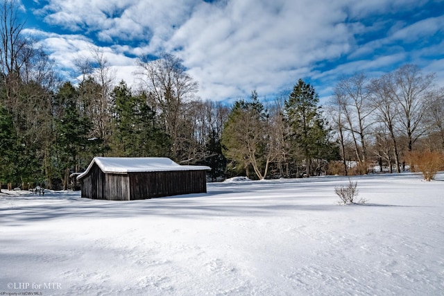 view of yard covered in snow