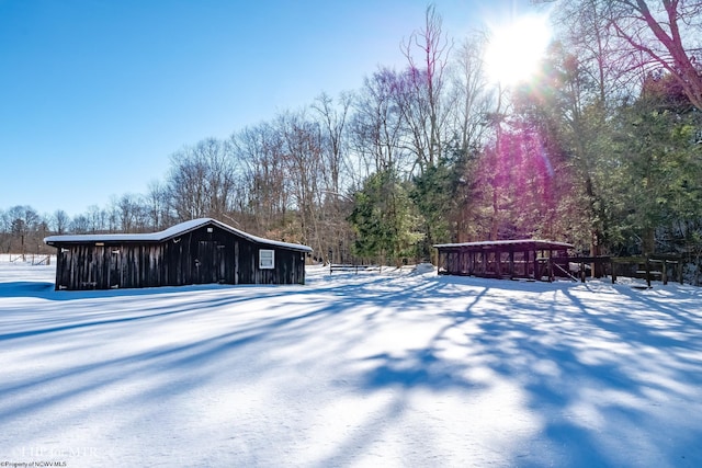 view of yard layered in snow