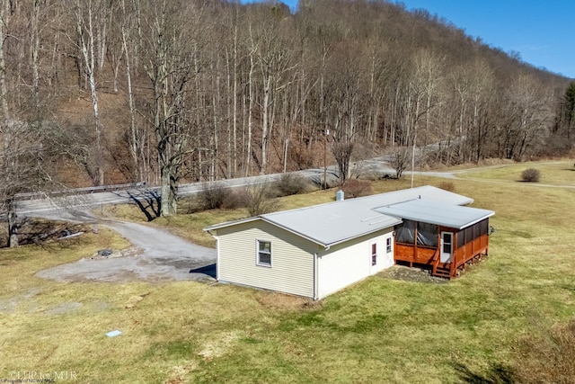 aerial view featuring a view of trees