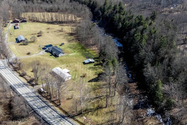 birds eye view of property featuring a rural view