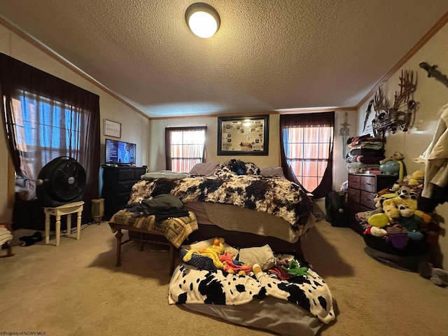 carpeted bedroom featuring a textured ceiling and crown molding