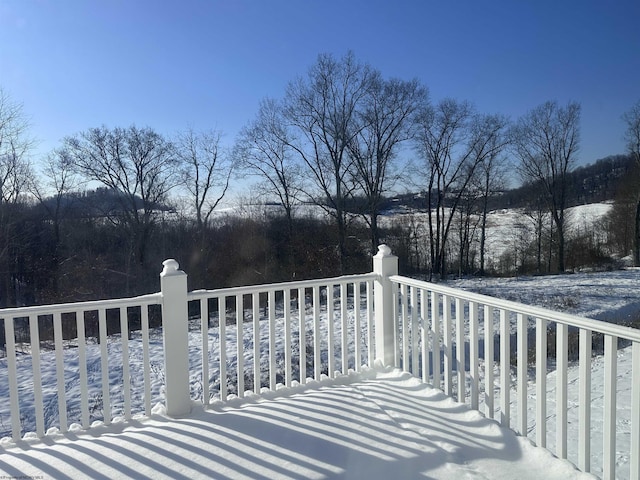 view of snow covered deck