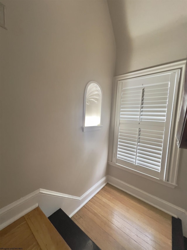 spare room featuring light hardwood / wood-style floors