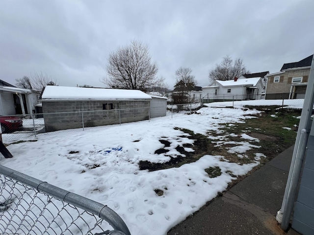 view of yard covered in snow