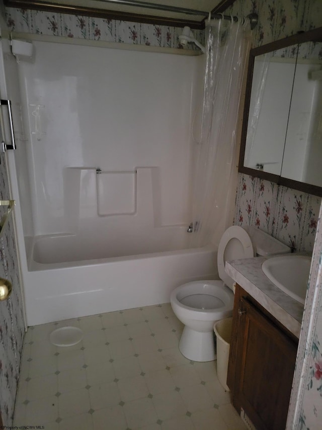 full bathroom with toilet, vanity, and shower / bath combo with shower curtain