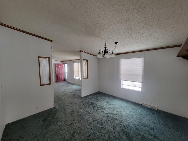 interior space featuring carpet floors, a textured ceiling, and an inviting chandelier